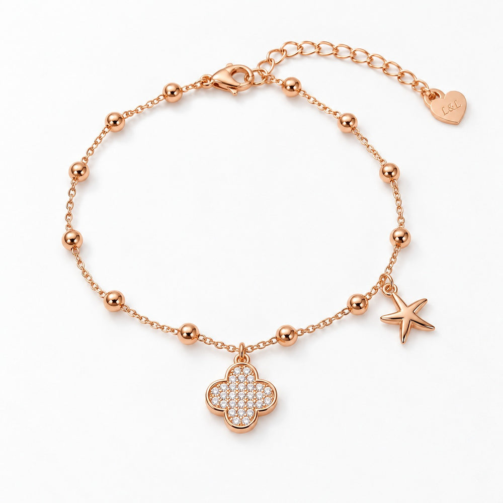 Lucky Four Leaf Star Bracelet Rose Gold - lắc cỏ bốn lá đá và sao biển, nền trắng