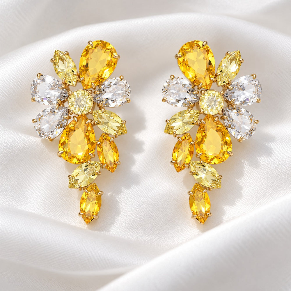 Cận cảnh chùm 11 viên đá giọt và marquise vàng, trắng