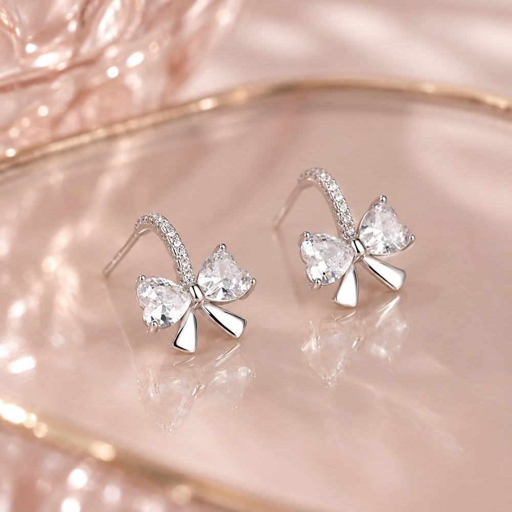 Innovative Bow Earrings Silver - ảnh cận