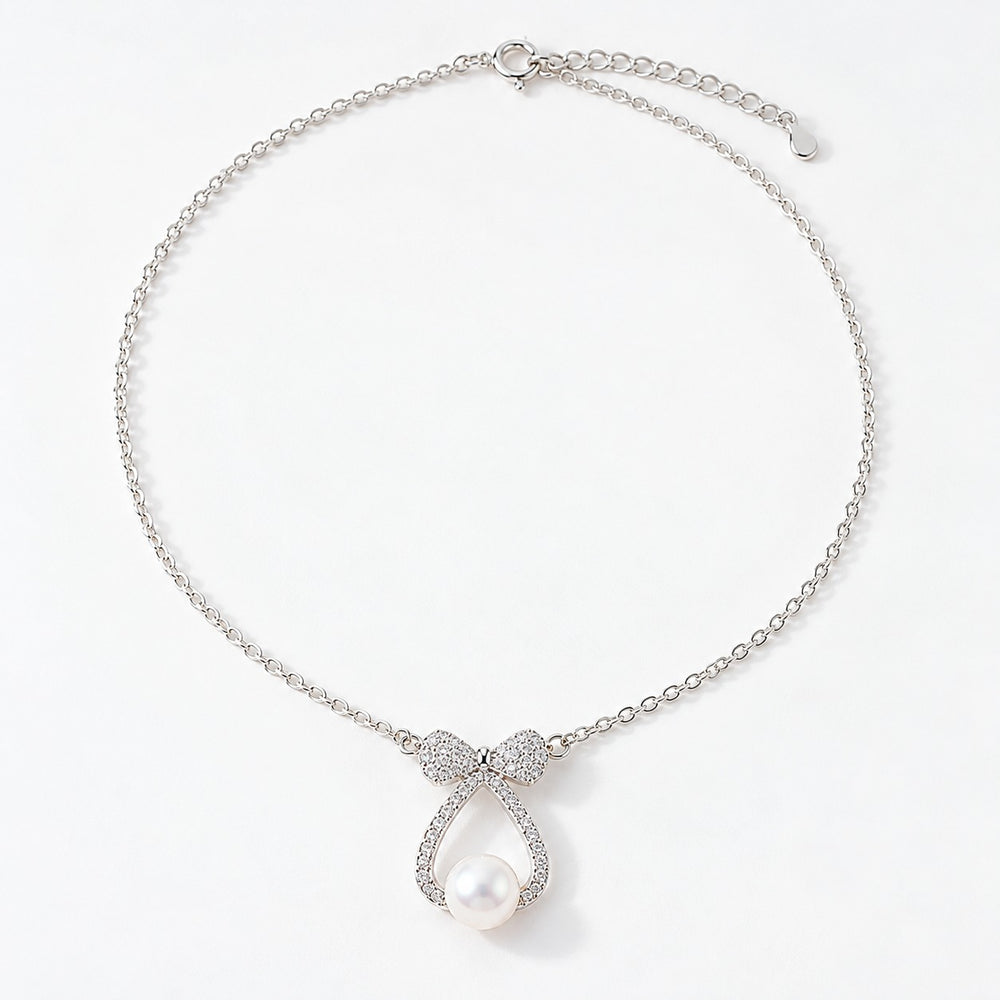 Dây chuyền nơ ngọc trai Pearl Bow 6434SV màu bạc, nơ đính đá ôm ngọc trai trắng - LAMY