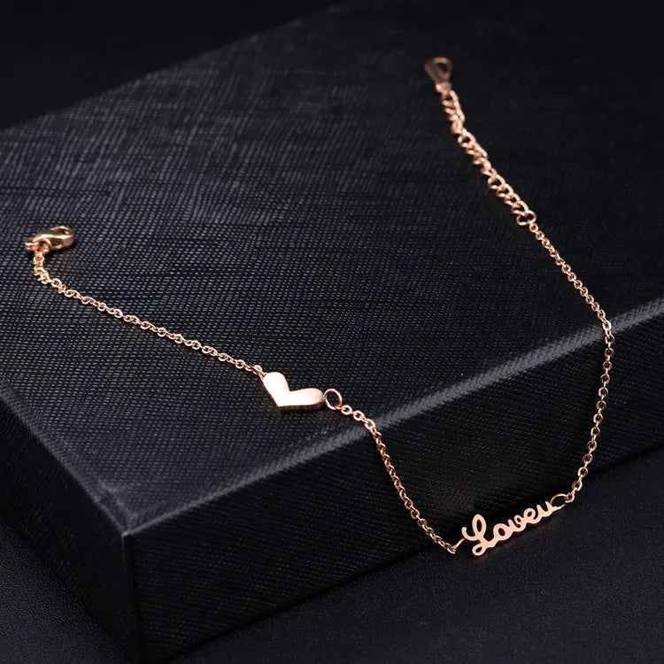 Heart and Love Anklet Silver, dây xích mảnh gắn một trái tim nhỏ và chữ Love viết liền nét nối với dây