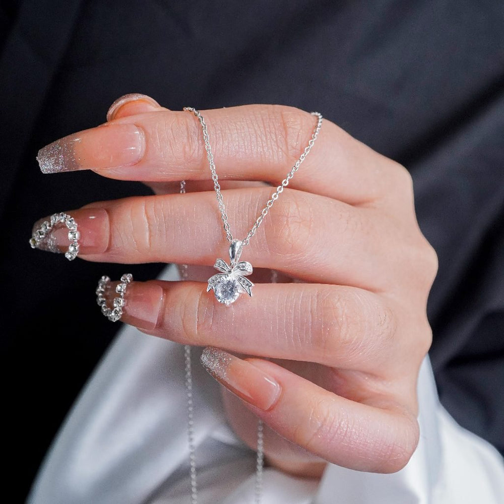 Bow Pendant Necklace Silver