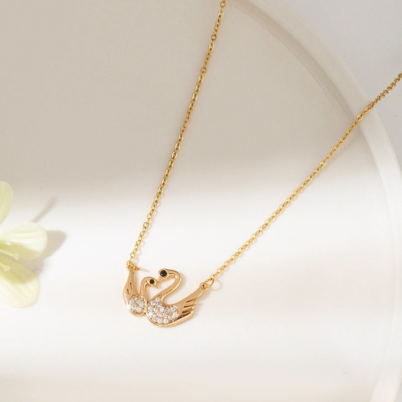 Dây chuyền đôi thiên nga vàng 6399GG - ảnh thật
