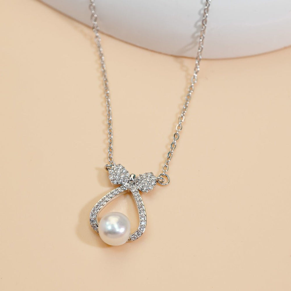 Pearl Bow Necklace Silver